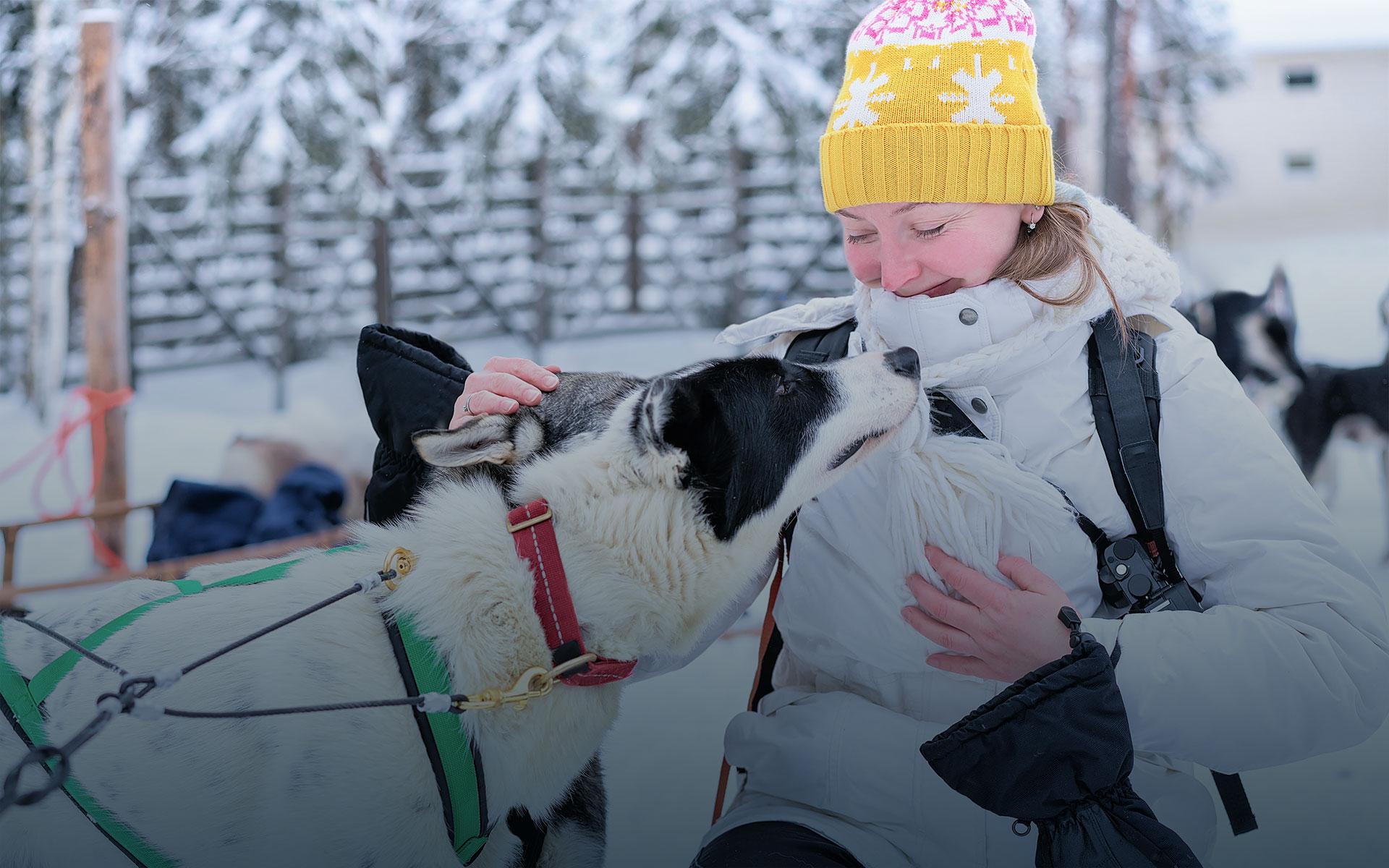 woman petting dog