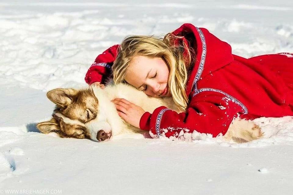 woman petting dog